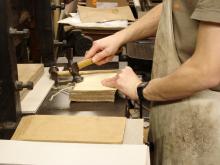 Rounding the sewn book.