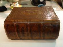 Finished reback, original spine relaid.